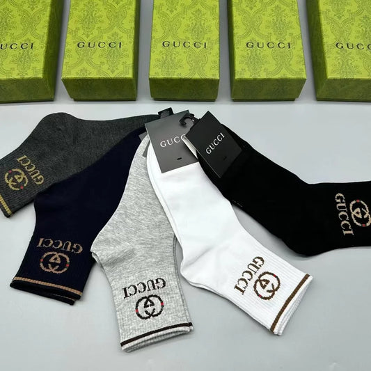 GUCCI || GG Logo Striped Ribbed Cotton-Blend Socks - FASHION MYST