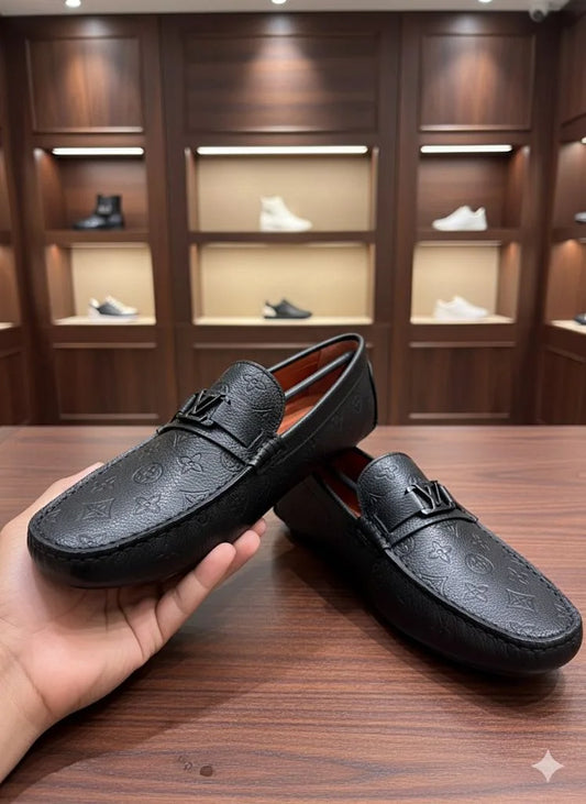 LOUIS VUITTON || Men's Hockenheim Loafers - Black Monogram Empreinte Leather - FASHION MYST