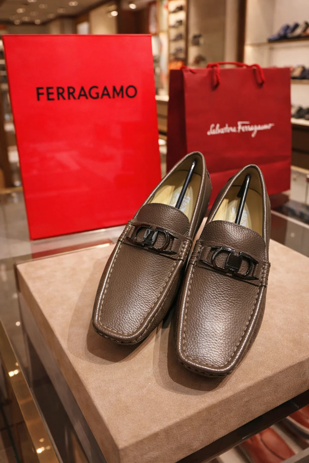 SALVATORE FERRAGAMO || Brown Pebbled Leather Gancini Loafers - FASHION MYST