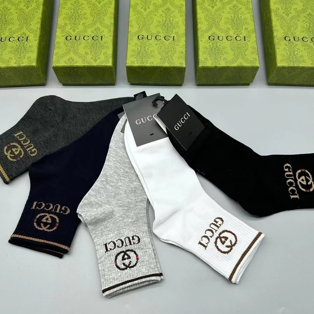 GUCCI || GG Logo Striped Ribbed Cotton-Blend Socks - FASHION MYST 