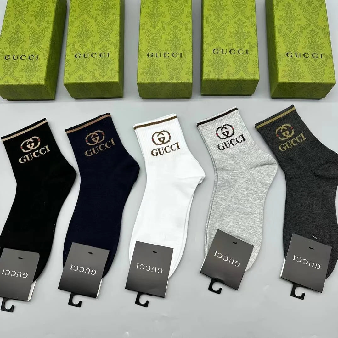 GUCCI || GG Logo Striped Ribbed Cotton-Blend Socks - FASHION MYST 