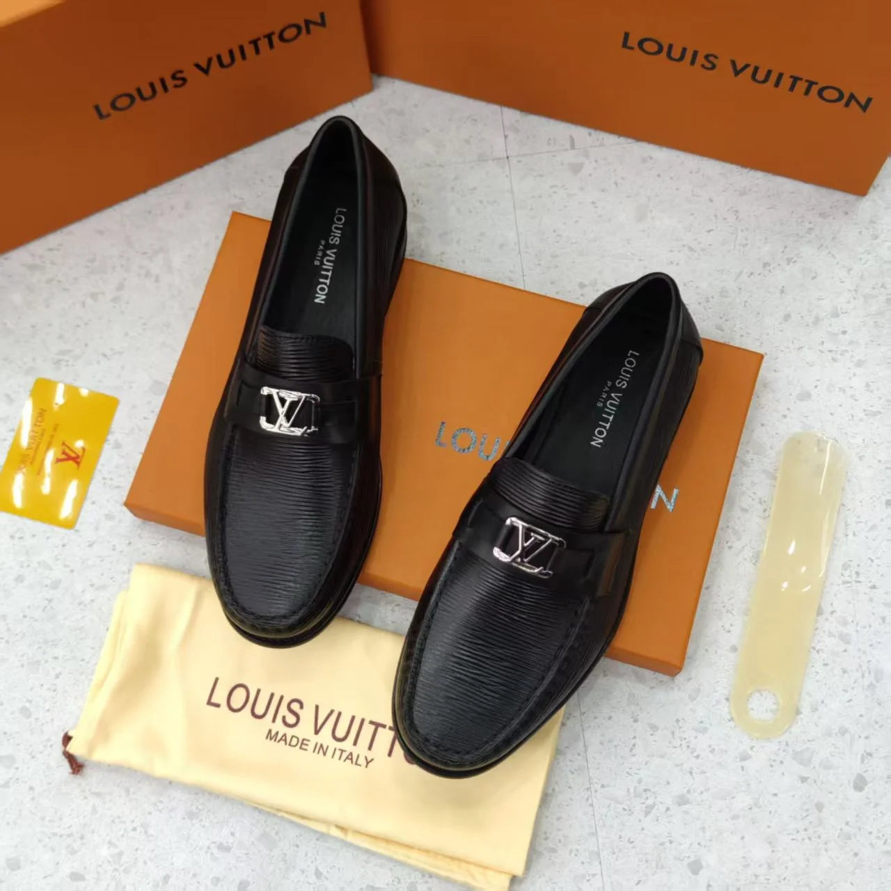LOUIS VUITTON || Black Leather Loafers with Silver LV Buckle  display picture 1