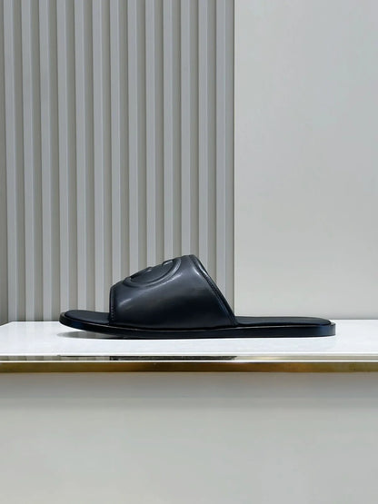 GUCCI || Black Leather GG Embossed Slides – Iconic Luxury Footwear- FASHION MYST