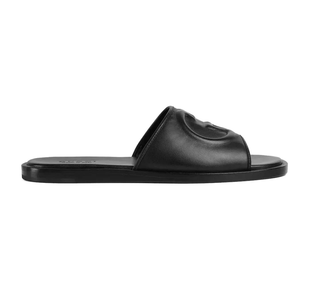 GUCCI || Black Leather GG Embossed Slides – Iconic Luxury Footwear- FASHION MYST