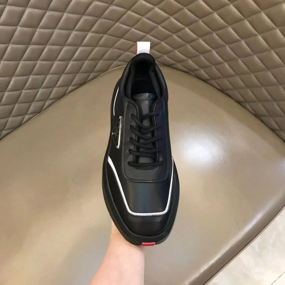 PRADA || Black Leather Sneakers with White Piping and Triangle Logo