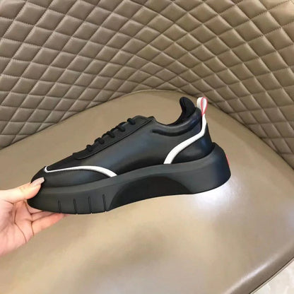 PRADA || Black Leather Sneakers with White Piping and Triangle Logo