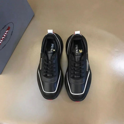 PRADA || Black Leather Sneakers with White Piping and Triangle Logo