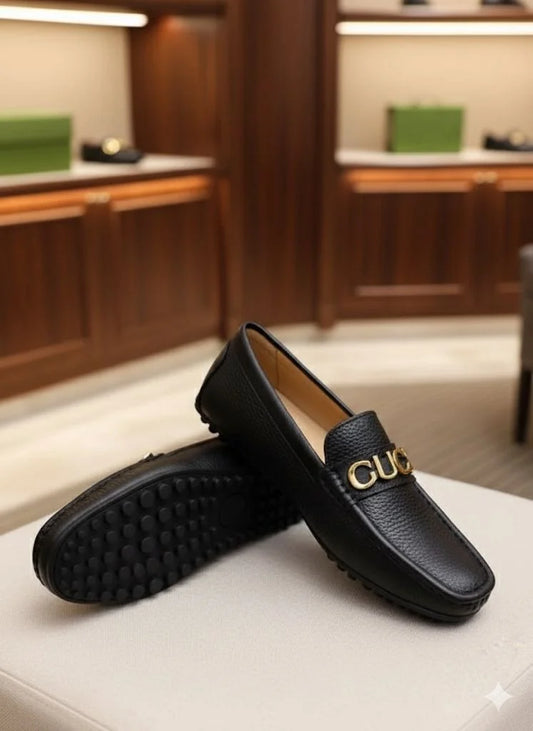 GUCCI || Men's Black Grained Leather Loafers with Gold GUCCI Script Logo - FASHION MYST