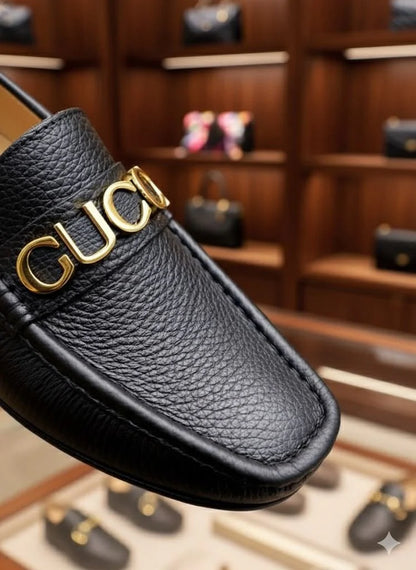 GUCCI || Men's Black Grained Leather Loafers with Gold GUCCI Script Logo - FASHION MYST