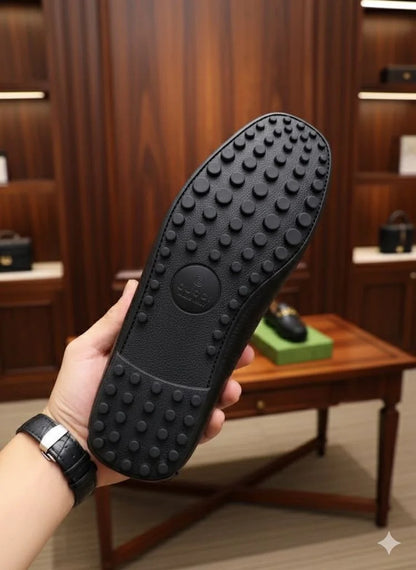 GUCCI || Men's Black Grained Leather Loafers with Gold GUCCI Script Logo - FASHION MYST