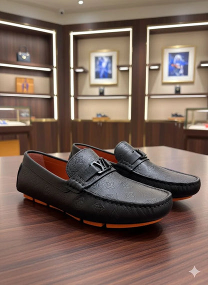 LOUIS VUITTON || Men's Hockenheim Loafers - Black Monogram Empreinte Leather - FASHION MYST