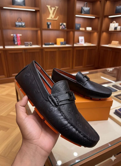 LOUIS VUITTON || Men's Hockenheim Loafers - Black Monogram Empreinte Leather - FASHION MYST