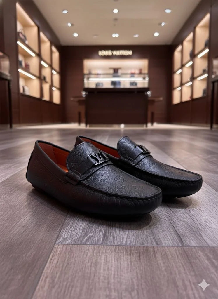 LOUIS VUITTON || Men's Hockenheim Loafers - Black Monogram Empreinte Leather - FASHION MYST