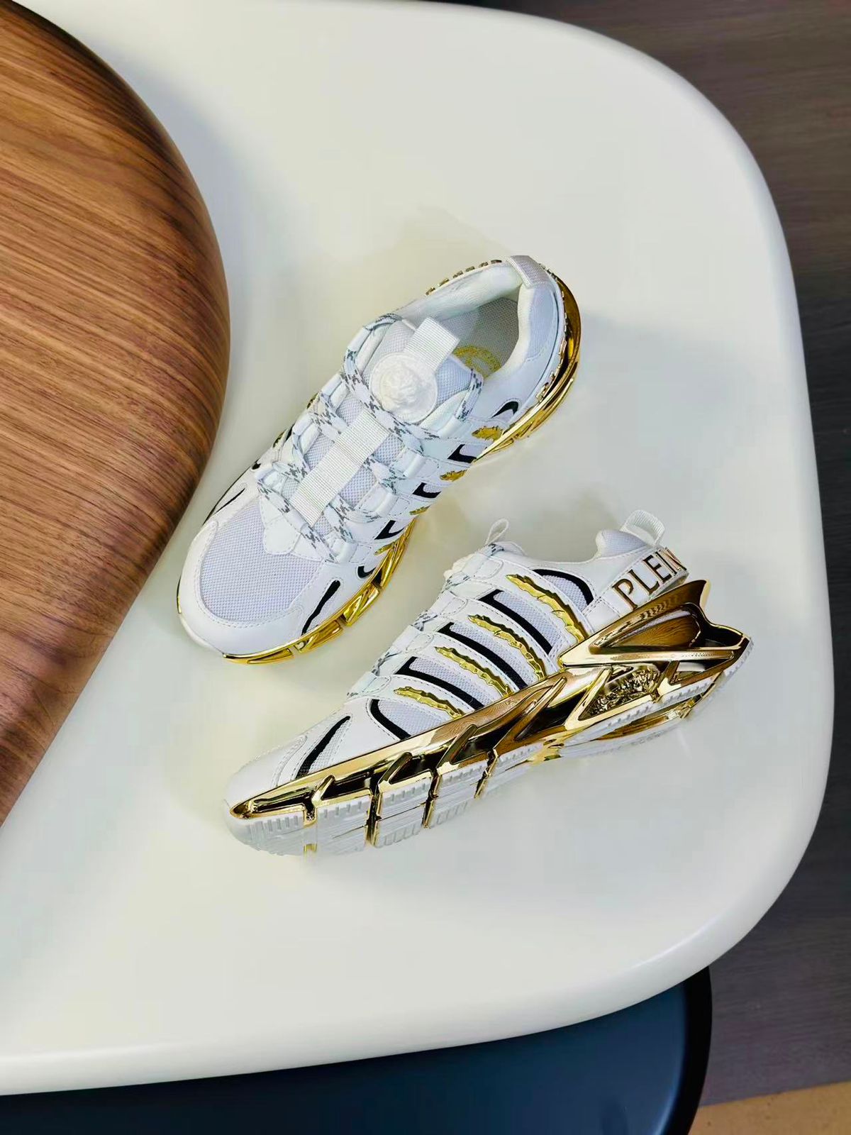 PHILIPP PLEIN || Luxury Men’s White Sneakers with Metallic Gold Sculpted Sole - FASHION MYST