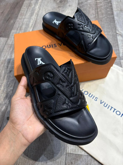 LOUIS VUITTON || Waterfront Mule – Monogram Embossed Black Rubber Sandals