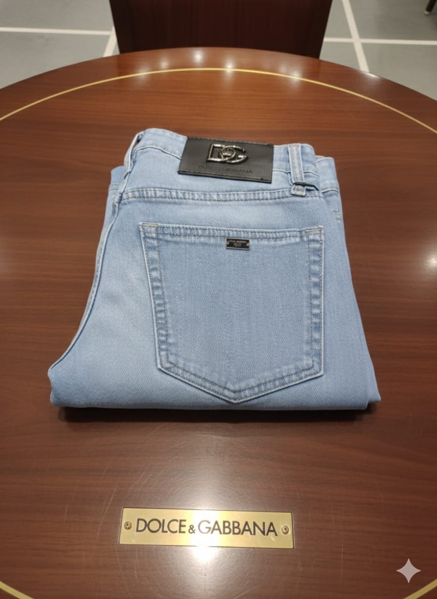 DOLCE & GABBANA || Men's Light Wash Slim-Fit Jeans with Signature DG Logo Plaque