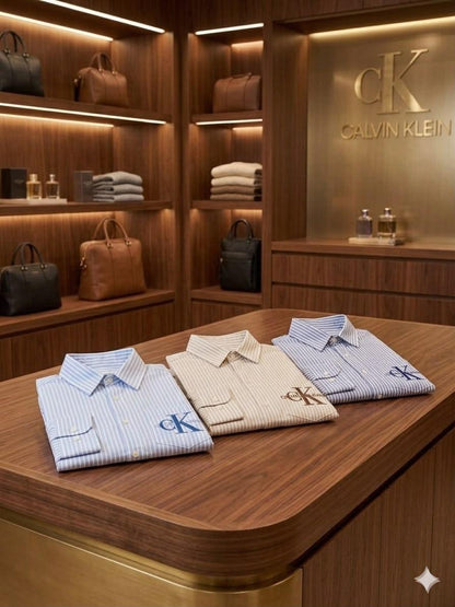 Designer-inspired Calvin Klein boys cotton shirts available in sky blue, cream, and blue
