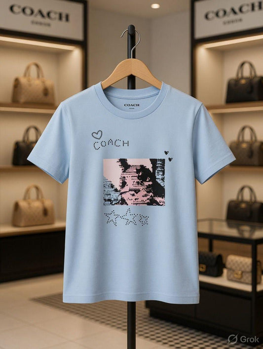 Coach Women's Crew Neck Tee in Sky Blue – Product Shot	