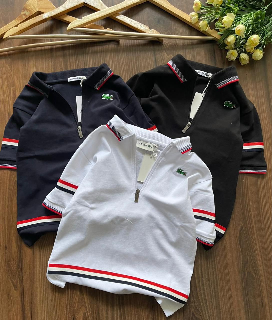 Lacoste Kids Polos – White, Black & Navy Collection

