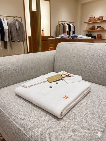 Hermès white luxury polo t-shirt with classic collar and half sleeves
