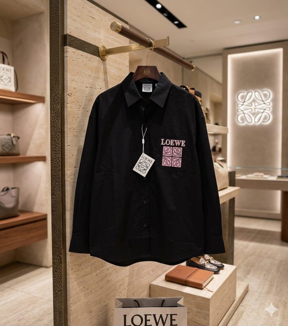 LOEWE black western women's wear clothing with Swarovski logo

