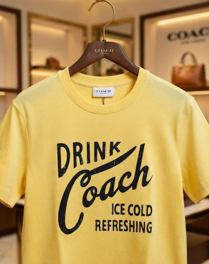 Yellow women's wear Coach baggy fit t shirt