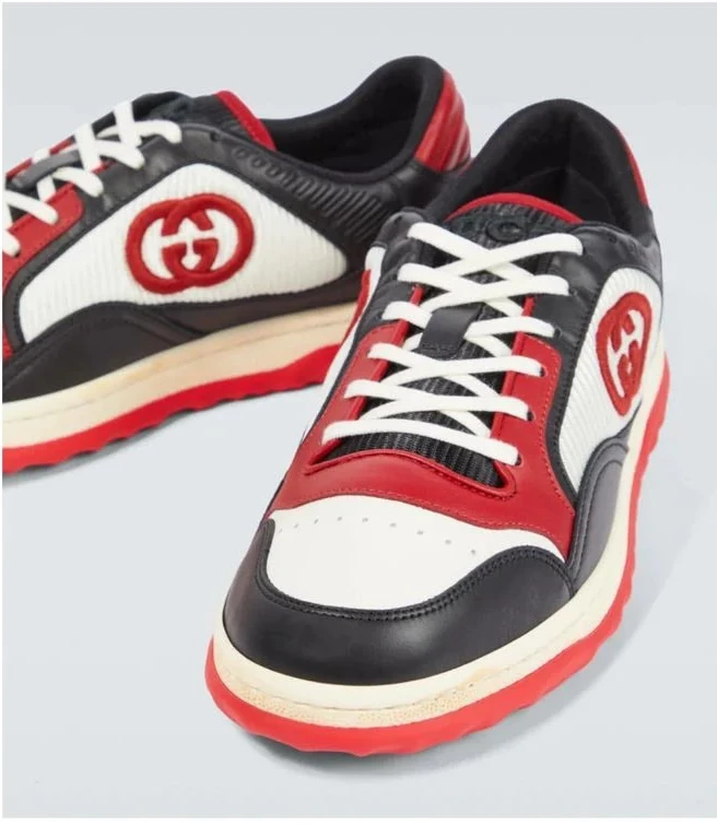 Gucci MAC80 leather low-top sneakers on a product page with Gucci logo.