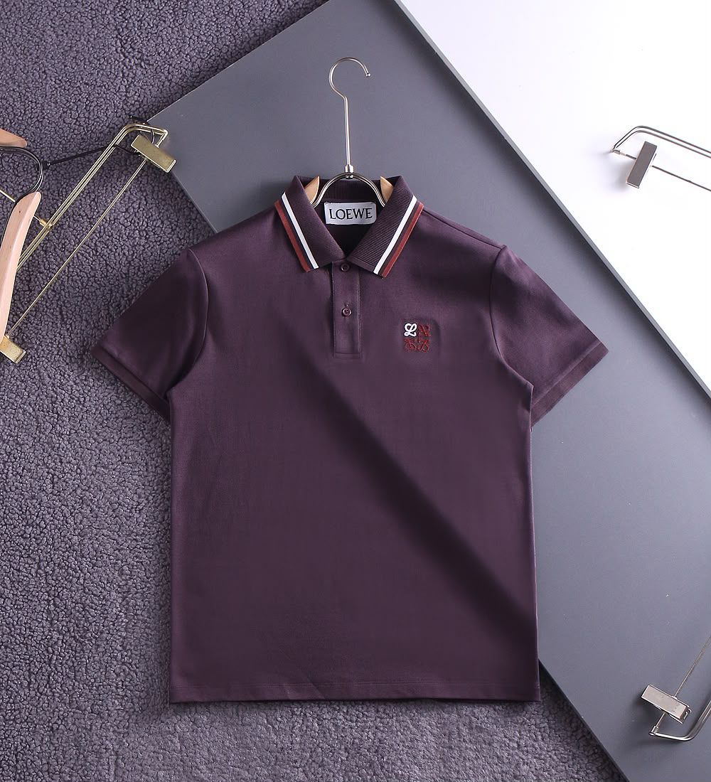 Plum premium polo shirt with striped collar on hanger, flat view
