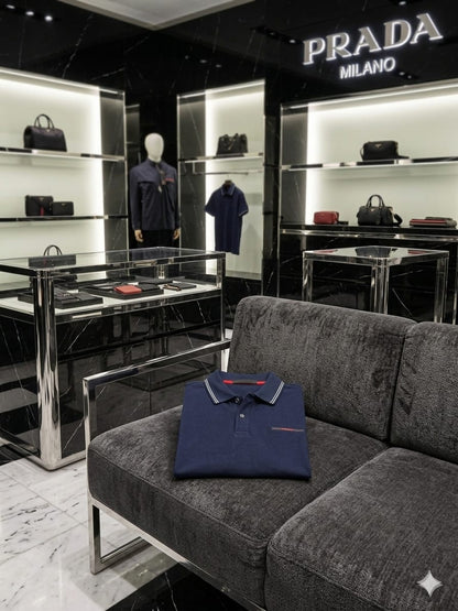 Prada navy blue luxury polo t-shirt with classic collar and premium finish
