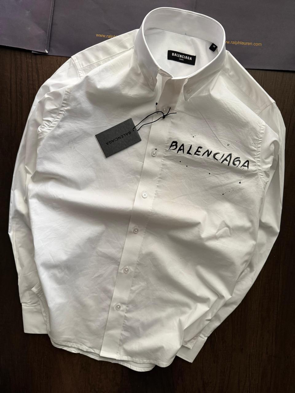 Balenciaga premium Raymond fabric regular fit shirts in white. 