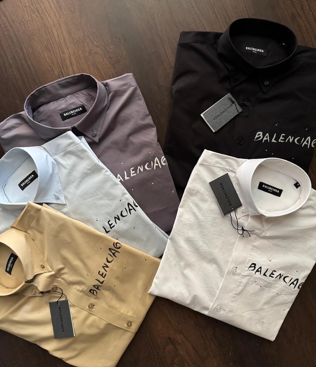 Balenciaga men's luxury designer shirts available in white, black, lilac, yellow, and sky blue
