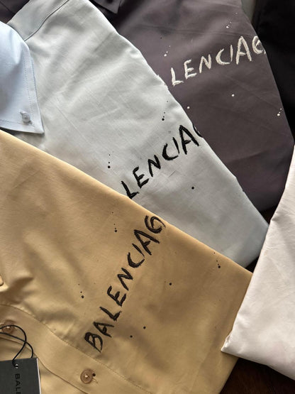 Balenciaga regular fit designer shirts in yellow and white with original accessories