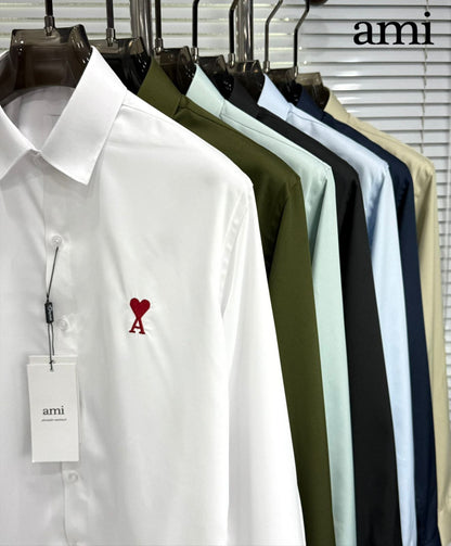 AMI Paris wrinkle-free cotton regular fit shirts in green, white, navy, dark green, black, blue, and cream

