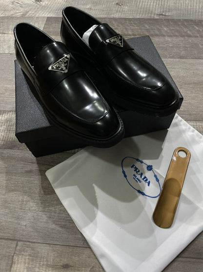 PRADA || Luxury Metal Logo Calf Leather Loafers For Men - FASHION MYST 