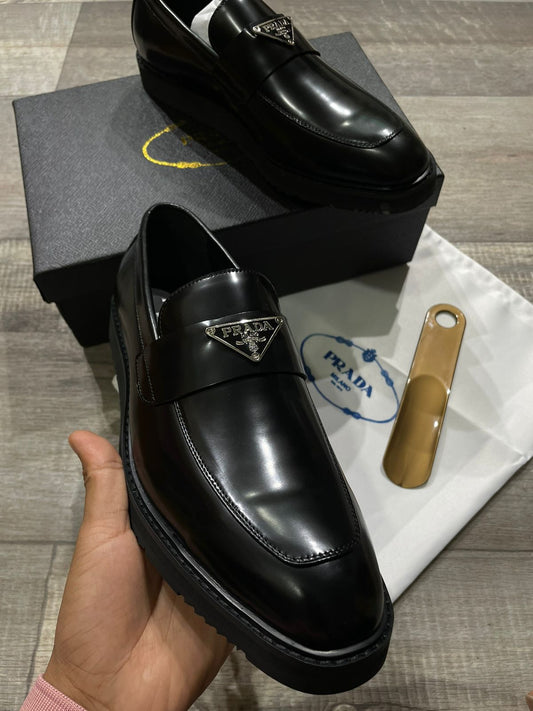 PRADA || Luxury Metal Logo Calf Leather Loafers For Men - FASHION MYST 