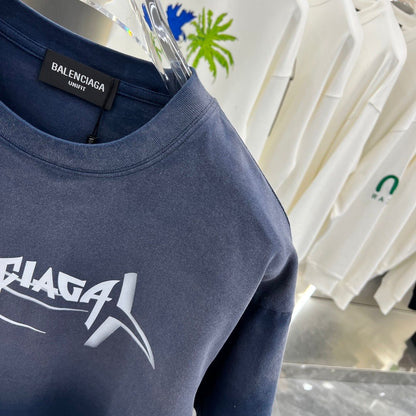 BALENCIAGA || Drop Shoulder Blue T-Shirt: Relaxed Style, Effortless Chic - FASHION MYST 